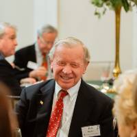 Bob Hooker talking with guests at the Foundation Holiday Reception